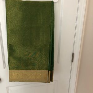 Brand new green and gold saree